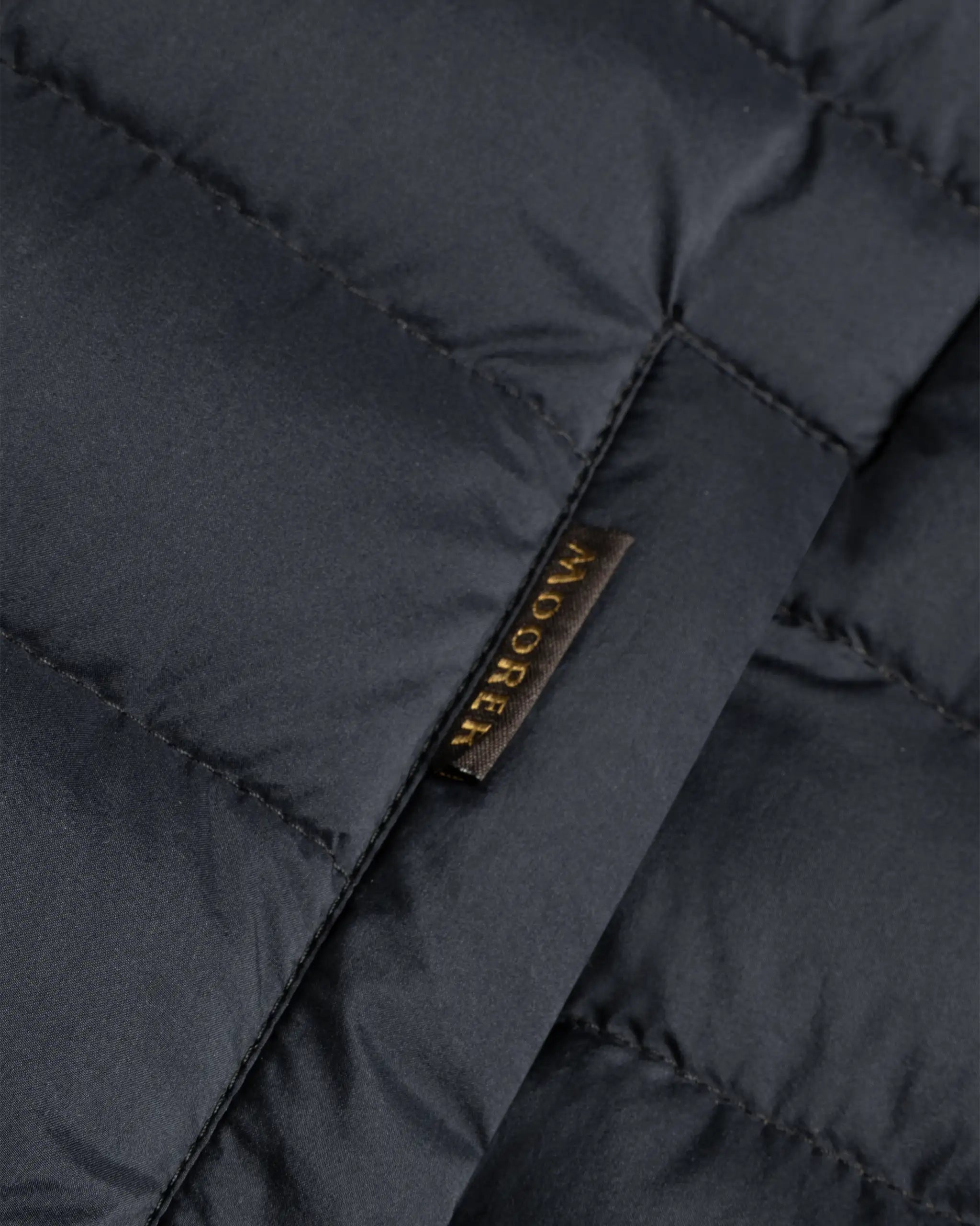 Dark blue stretch eider down vest from Moorer 