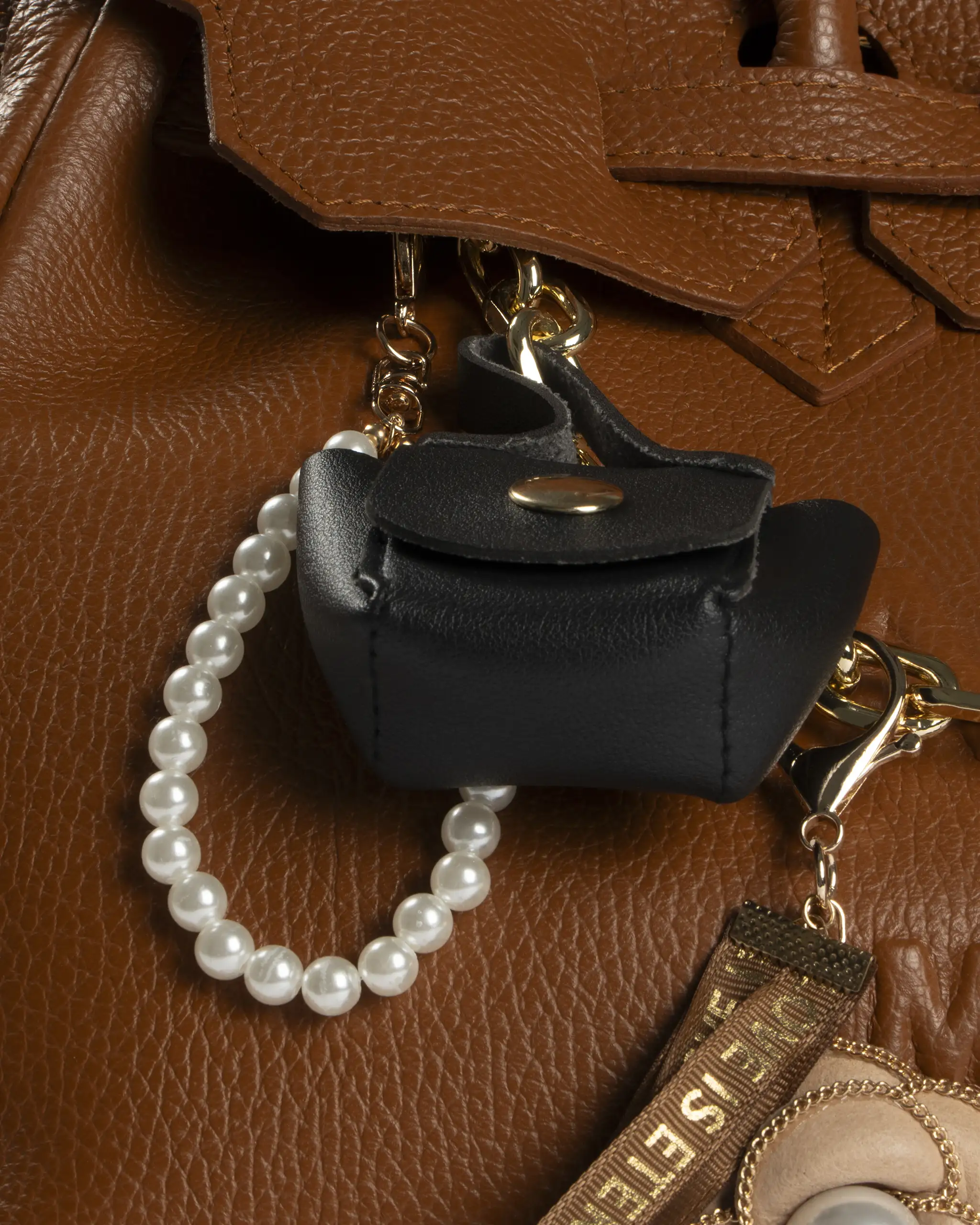 Cognac-Golden Kelly Bag made of leather with decoration by Mia Bag 